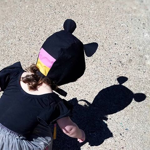 Spring in Wisconsin means seeing your shadow for the first time all over again. Tilly could not get enough of her  bear eared shadow. "Bear, bear, baby bear" Her bonnet is a custom from @jackieandolives  the shop opens 4-30 with ready to ship bonnets. Use code TILLY10 to save .
☀️
👶
🐻
#jackieandolives