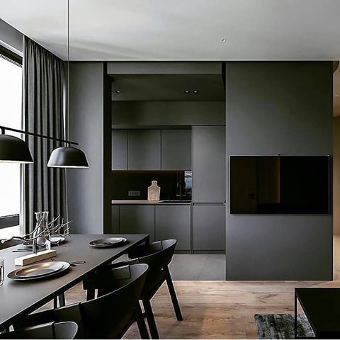 SIMPLE SLIM SHADES 
Fine simple forms and lines gives this open kitchen a sophisticated look. The beautiful black matt finish enhances the elegance. 
So, Breath the Simplicity!
Via @architecturedelux
https://www.bubble66.com/blog/simple-slim-shades
.
.
.
.
.
.
Via @architecturedelux 
#blackdesign, #blackinterior, #boligmagasinetdk #interiordesignblog, #interior, #interiors, #interiorinspiration, #interorinspo, #interiordesign, #design, #luxury, #homedesignideas, #decoration, #decor, #architecture,#vougliving, #designinspo, #inredning, #inredningsdesign, #inredningsblogg, #interiör, #inredningsinpiration, #inredningsispo, #skönahem,#instadecor #elledecor, #houseandhomemag #Bubble66, #66Bubble @66bubble