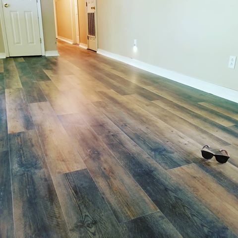 Hard work really pays off,this floor turned out great. Thanks for teaming up with me on this job dad ,it was epic. @bosterron #wpcflooring  #laminateflooring #rigidcore