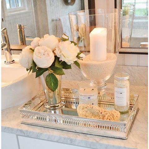 Some bathroom inspiration for you this morning. I love how elegant this looks. Do you know that space between double sinks that you just don’t know what to do with? Hopefully this will help spark some ideas. Happy Friday