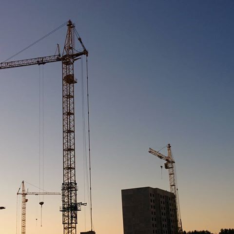 #construction #building #crane #photo #photography #composition #sunset #sky #gradient #development #process #lowlight #blue #yellow #grey