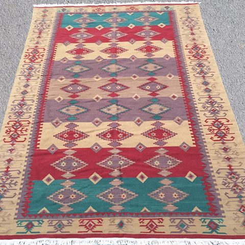This is a beautiful Vintage Turkish Azeri slit-weave kilim rug. It was handwoven with 100% natural wool. This one-of-a-kind beauty contains warm color palettes and eye catching geometric medallion design combinations and motifs throughout.
.
It measures 9' 3” x 6' 2” and ships free with insurance within the US! There’s a link in my bio to check it out!✨