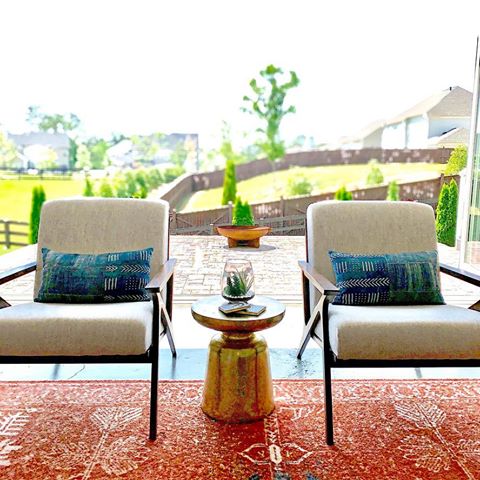 Let the sun shine...let the sunshine in 🎼🎤. I might have been singing that when I opened up our doors. Living my best indoorsy life while getting a little outdoorsy feels. Not a bad view for the burbs. My Otio chairs from @article just makes it all the more sweeter. What do all you homebodies do when it’s this gorgeous outside?  #homedecore #outdoorin #midcenturymodern #midcenturychair #homesweethome #homebodylife #hombody #basementremodel