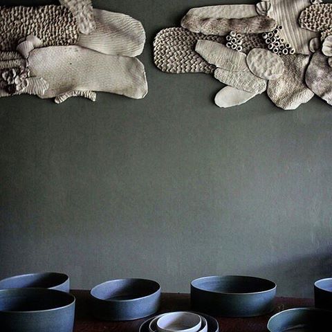 This picture features a detail of an old showroom's display in Ubud. On the table a series of porcelain serving bowls with opaque mix glazes and on the wall two smoke fired "coral" art pieces. 
From simple functional shapes to complex and organic art installations .... This explain the variety and flexibility of our work.
.
.
.
.
.
.
#gayaceramic #gayacac #underwater 
#pottery #clay #eatclaylove #ceramics #ceramic #porcelain #craft #showrrom #handmade #handcraft #home #coral #installation #homeware #decor  #interiordesign  #decoration #bowl #food  #chef #hotel #art #kinflok #welovewhatwedo #bali #ubud #foodprops