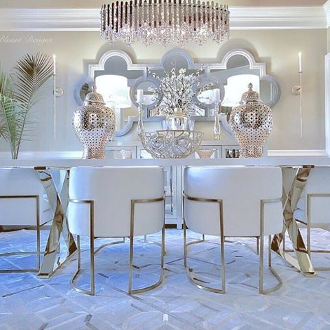 All the stops were pulled out to achieve this stunning dining room by @blountdesigns. Deb was so inspired when she saw the sneak peak of @swarovski’s Chatter collection that she decided to completely revamp the whole space to accommodate it! We couldn’t have dreamt this up if we tried. The glitz and glam is on another level and we can’t imagine a more glamorous space to showcase this stunner of a chandelier. It is definitely the icing on the cake of this incredible room. Swipe to see the video for the up close details of the Chatter chandelier from Schonbek by @Swarovski and to see why @blountdesigns fell in love! 💛💛💛✨✨✨
Tell us what you think 🤗. .
.
.
..
.
.
.
Follow us @capitollighting for more lighting and decor inspiration ✨. Turn on post notifications so you never miss a post 👍🏻
.
.
.
.
.
.
.
.
.
#capitollighting #livebrilliantly #interiordesigner #diningroom #diningroominspo #diningroomdecor #decorinspo #diningroomtable #glamdecor #glamhome #mybhg #housebeautiful #neutraldecor #homegoods #currentdesignsituation #bhgstylemaker #elledecor #interiordesigninspiration #finditstyleit #maketimefordesign #interiordecorating #inspire_me_home_decor #interiorandliving #interiordecorator #diningchairs #diningroomlighting #homeinspo #houzz #whitedecor #bhghome