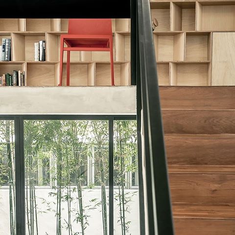 Ledge House. #bamboo #bookshelf #plywood #somewherequiet #stilllife #concrete #courtyard #study #staircase #landedhouse #semidetachedhouse #house #cantilever #verticality