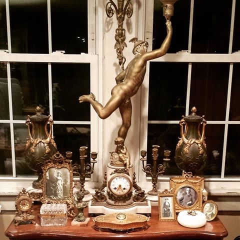 View in our living room. 
Our objects, bibelots, whatnots, and knickknacks say the most about who we are. They are as honest as a diary.
#antique #collection #antiques #antiquestyle #antiquedecor #home #homesweethome #lovewhereyoulive #gold #gilt #gilded #view #currentview #instaantiques #instaantique #display #mercury #greekgod #greekmythology #malenude #victorian #instalike #instagood #instabest