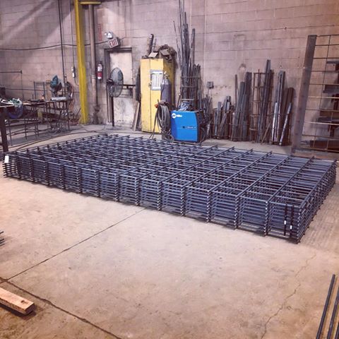 These fabricated rebar mats will be cast as lids for a large precast holding holding tank. #kitsteel #rebar #rebarsteel #rebarshop #precastconcrete #concrete #construction #concretelovers #madeincanada #thoroldontario #welding #weld #steelfabrication #steel