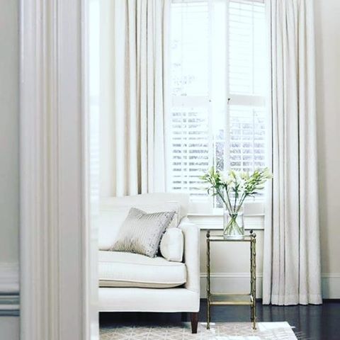 What could be more classic than plantation shutters layered with crisp drapes. Repost @providenthomedesign #classichomes #classichome #whitelivingroom #classicdesign #classicstyle #classicinteriors #homedecoratingideas #diyhomeimprovement #diyinteriordesign #diyhomedecor #diyhome #homedesignideas #livingroomideas #propertystyling