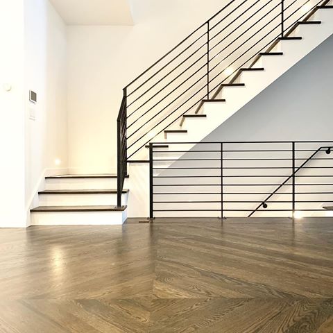 We love this view! The diamond floor pattern differentiates the dining space in this open floor plan and that incredibly sleek railing is 🔥 
#designdriven 
#mtpleasantproject
Architecture/Design by @jobijonesllc .
.
.
.
.
.
.
.
#buildersofig #moderncraftsman #keepcraftalive #contractor #contractorlife #renovation #design #designdriven #architecture #archilovers #fhb #dccontractors #interiordesign #dcbuilders #homedesign #interiors #designinspo #finehomebuilding #designbuild #instahome #dchomes #instagood #customcabinetry #millwork #woodworking #diamondpattern #flooring #modernrailing #stair
