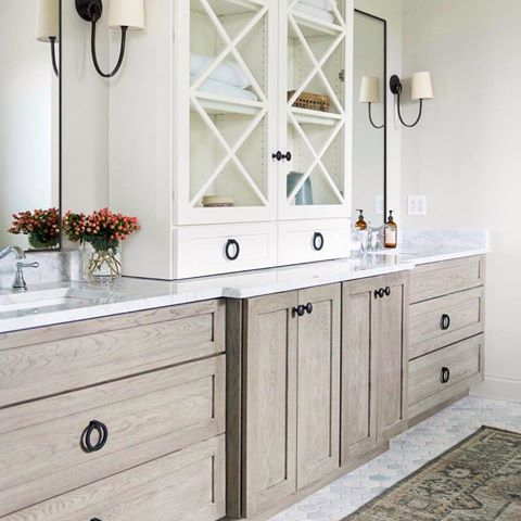 Throwing it back to our #brooksidetransitional project from a few years back. The mullet vanity, as I like to refer to her. Business on the bottom, party on top. Check out the May/June issue of @americanfarmhousestyle magazine, for a full feature on this project. 🖤 | 📸 @mrssarahshields •
•
•
•
•
•
#design #interiordesign #designinspo #design123 #interiors123 #bathroomdesign #houseandhome #housebeautiful #smmakelifebeautiful #sodomino #mydomaine #lovelysquares #modernliving #indianapolis #indianapolisdesign #indianapolisdesigner #indianadesign #zionsville #carmel #westfield #fishers #indystyle #indyliving #keepindyindie #whittneyparkinsondesign
