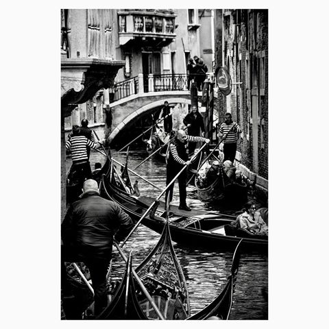 Seven Gondoliers.
Venice, Italy. Apr 2019.
.
.
.
#friendsinperson #streets_storytelling
#challengerstreets
#friendsinstreets
#streetizm
#shared_streets #streetweekly
#repostmyfujifilm #streetphotography
#thestreetphotographyhub
#_soulsofthestreet #fujifilm
#streetsgrammer #fujifeedstreet
#everybodystreet
#streetphotographerscommunity
#myspc #photoobserve #dpsp_street
#dreaminstreets #streetscene
#fujifilmx
#street_photography #candid
#streetphoto #street
#bnw_street 
#blackandwhite