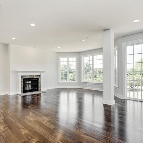 Bring richness and polish to your living space with beautiful, dark hardwood floors - paired with white walls and large windows to help brighten this space, creating a harmonious contrast for an elegant arrangement. •
•
•
•
#mitchellandbest #homebuilder #highlandreserve #kenbridgemodel #myhomestyle #newhomes #howardco #visithowardco  #visitmaryland #visitmd #realestatemd #mdrealestate #realestate #realtors #luxuryrealestate #archilover #archidaily  #homesweethome #homeinspiration #instahome #dreamhome #topagent #toprealestateagent #luxuryhomes #homestyle #homedesign #interiorstyling #realestatelife #realtor