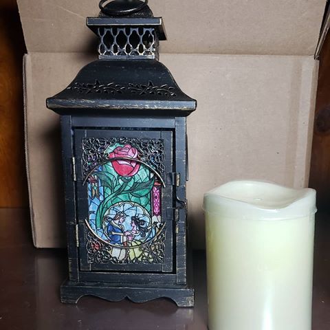 Happy Monday! 
One of our Beauty and the Beast Inspired Lanterns is off to it's new home! 🌹 The Beauty and the Beast Inspired Lanterns all come with an LED candle that has a timer feature so you can set it and forget it. ⏰🙂
.
.
 There are only 2 more in stock at the moment and they are ready to ship! If your Mom is like mine she would love this as a Mother's Day gift. (Don't tell my Mom but this is exactly what she is getting as a Mother's Day gift.🤣🤫🤭) .
.
Just a reminder the Comic Book pillows ship free for 3 more days! .
.
#happymonday #beautyandthebeast #beautyandthebeastinspired #beautyandthebeastlantern #beautyandthebeastlight #beautyandthebeast🌹 #beautyandthebeastweddingtheme #beautyandthebeastdecor #stainedglasslook #disnerd #mothersdaygift #mothersdaygiftideas #disneyinspired #bookshelfdecor #disneyprincess #belle #princeadam #beourguest #beautyandthebeastrose #ledcandle #bookshelfdecor #orderout #etsy #orderonetsy #niftynerdstore