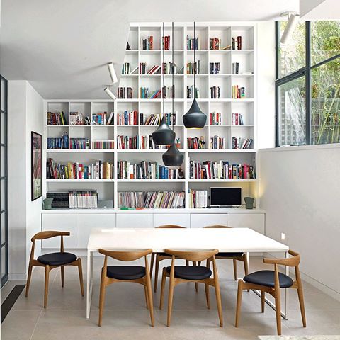 If space is at a premium, you don’t need a dedicated room to house a hefty collection of well-thumbed novels or oversized books. This clever bookcase design, created by west London architects @stifftrevillion, draws the eye up to and above the mezzanine level, affording the colourful tomes pride of place in an otherwise neutral setting. It's every bibliophile's dream come true.
.
.
.
#fabricmagazine #luxurylondonliving  #luxuryinteriors #homelibrary #morethanabookshelf #bookstorage #cleverdesign #neutralinterior #luxuryinteriors #bookcase #spacesavingstorage #bibliophile #bookworm