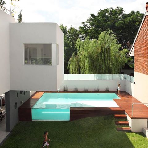 This is the Devoto House, a 500 sqm. urban home with an elevated swimming pool creating a glass wall that allows views from within and the outside. Since the site had issues with isolation and view, the house is leaning towards its neighbour to create privacy and allow the architecture to generate its own views. The house is designed by @remyarchitects and is located in BuenosAires Argentina
📸by @alejandroperalphotography .
.
.
.
.
.
#pooldesign #swimmingpooldesign #designerhome #realestate #luxuryrealestate #architecture #interiordesign #houseaddictive #homeoftheday #houseoftheday #beautifulhouse #residentialdesign #interiorlovers #villas #dreamhome #photooftheday #archdigest #forbes #zillow #curbed #businessinsider #airbnb #realtor #agent #modernhomes #modern #restlessarch #propertytent