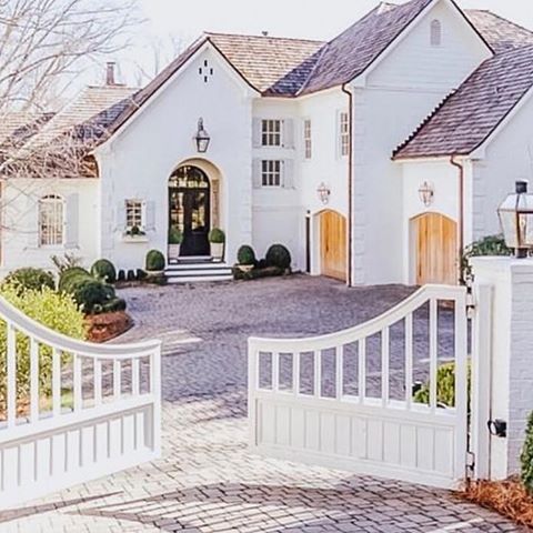 #Repost @jettsetfarmhouse
・・・
A gated drive ✔️ Painted brick ✔️ Beams galore ✔️ A cozy back porch ✔️ AND a fabulous She Shed✔️ What more could you possibly ask for?!? What are your thoughts on the mismatched front door and garage doors? I’m curious to hear what you all think! .
.
.📷 source unknown let me know if you know who it belongs to! .
. 
#farmhousedesign #ighome #makehomeyours #finditstyleit #homedesign #mydomaine #myhousebeautiful #smmakelifebeautiful #styleathome #farmhouseinspo  #instadesign #houseandhome #farmhousestyle #curbappeal #dreamkitchen #interior123 #hometour #ruedaily #interiordesign #howyouhome #farmhouselove #currentdesignsituation #sodomino #kitchensofinstagram #farmhousestyle #modernfarmhouse #modernfarmhousestyle #exteriordesign #newconstructionhomes