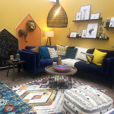 Bold yellow walls with contrasting blue sofas combined with rustic burbur style rugs brings this child friendly family living space totally alive...what do you think??? We love the wildlife on the walls. .
.
.
#interiordesignideas #interiorideas #interiorgoals #luxuryhomes #creativedesign #architecturedaily #interior2you #archilife #homeinteriors #interiorlove #houseinterior #homeinspo #architectureanddesign #archidesign #loftdesign #loftinterior #architecturedesign #interiordesign #interiorlovers #houseinspo #interiorarchitecture #interiorarchitect #homeinterior #interior4all #interior4inspo #idealhomeshow #burbur