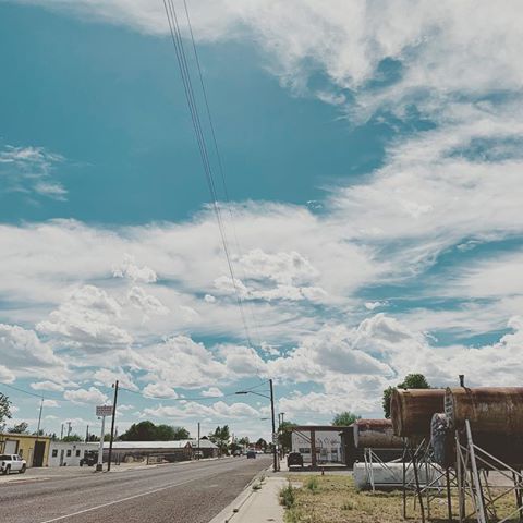 “When I do not walk in the clouds, I walk as if I’m lost...”☁️ #photo #marfatx #shotoniphone #picture #marfa #pic #clouds #sky #blue #value #street #buildings #explore