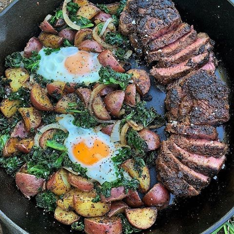 Perfect camp food? Chipotle Garlic Filets and potato kale hash in cast iron!. 🍳 🔥 rate this out of 10 🤤 @globaloutdoorsurvivalclub
.
📸: @overthefirecooking  #overthefirecooking #castiron #firecooking #outdoorcooking #openfirecooking