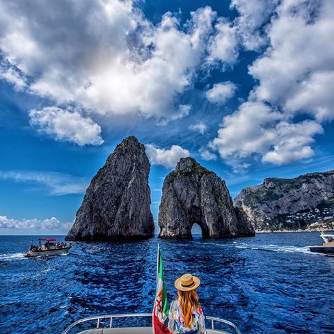 Have you been in Capri? *********
Around the world with me - Capri - Italy *
**********
Blue Paradiso - @capaseccayacht yacht + @robertavinci.it  Roberta + the iconic Faraglioni Stacks - such a bellissima combination. **********
Grazie  @capaseccayacht for this memorable experience. We enjoyed Capri on board of this amazing luxury yacht and had delicious lunch in front of the famous Faraglioni. Salute 🥂 #capaseccayacht #capaseccaexperience