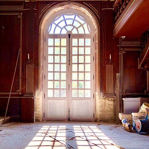 I want to share with you this week’s progress at the château.  In the following photos you will see the “after” and “before” photos in the former chapel. I wrestled for almost a year about whether to remove the beautiful stained glass windows.  In the end, I decided that as spectacular as the chapel was, I would not really use it much as it was.  So, I had it deconsecrated and began the renovation. The first step was carefully removing the stained glass windows and opening up the arches into doorways.  One now enters directly into the château and the other to the gardens.  I copied the new doors (seen above) from others at the château.  It totally opened up the space and is the first step in  its transformation.  One of the most important steps in any restoration is figuring out what needs to stay and what needs to change to fit the needs of the day.  It is rarely an easy decision.  After looking at the various photos, I hope that you can understand why I made the decision I did.
.
.
#restoration #renovation #choices #architecturephotography #architecture #arkitektur #chateau #castle #palazzo #schloss #deco #decor #design #interiordesign #interiors #interieur #decoracion #decoração #construction #wood #doors