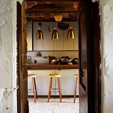 The flagstoned kitchen at Château de la Bourlie, a medieval estate with aristocratic roots in France's Dordogne that can be taken over as your own as featured in the June 2019 issue. Get your copy at traveller.uk/buythisissue or at the 'Issue' story highlight pinned to the top of our feed for more. @chateaudelabourlie 📸 @simonuptonphotos #Dordogne #France