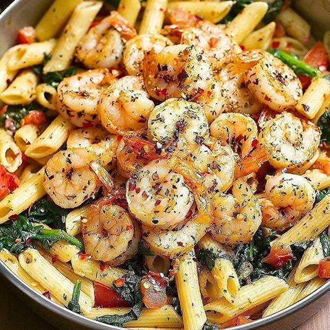 Also check @foodtipz for more .
.
TOMATO SPINACH SHRIMP PASTA
By @eatwell101
~
2 tablespoons olive oil
8 oz (220g) medium shrimp, peeled and deveined
1/4 teaspoon red pepper flakes
1 teaspoon smoked paprika or more, to taste
Kosher salt and freshly ground black pepper, to taste
1 teaspoon italian seasoning
4 roma tomatoes, chopped
1/4 cup fresh basil leaves, chopped
6 oz fresh spinach
3 cloves garlic, minced
8 oz (220g) pene or spaghetti
2 tablespoons high quality olive oil, optional
1. Add 2 tablespoons of olive oil to a large skillet, on medium-low heat. Add shrimp, red pepper flakes, paprika, Italian seasoning and salt in the skillet and cook on medium heat until shrimp is grilled cooked through, about 5 minutes. Remove shrimp from the skillet and set aside.
2. In the same skillet, add chopped tomatoes, chopped fresh basil leaves, fresh spinach, and chopped garlic. Cook on medium heat about 3- 5 minutes until spinach wilts just a little and tomatoes release some of their juice. Remove from heat and adjust seasoning, if needed. Cover with a lid and keep off heat. 
3. Cook pasta according to package instructions, until al dente. Drain pasta and add to the skillet with the tomatoes and spinach. Reheat on low heat, mix everything well, adjust seasoning with salt and pepper. Remove from heat.
4. Once pasta and veggies are off heat, add grilled shrimp back and drizzle with good quality olive oil just before serving, for an extra taste. Serve the shrimp pasta immediately, enjoy!